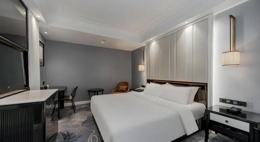 Bed in Jinjiang Metropolo Hotel Nanjing Confucius Temple Branch