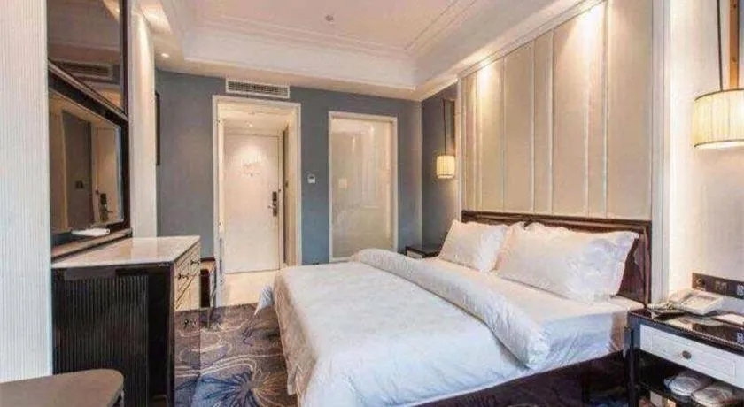 Bed in Jinjiang Metropolo Hotel Nanjing Confucius Temple Branch