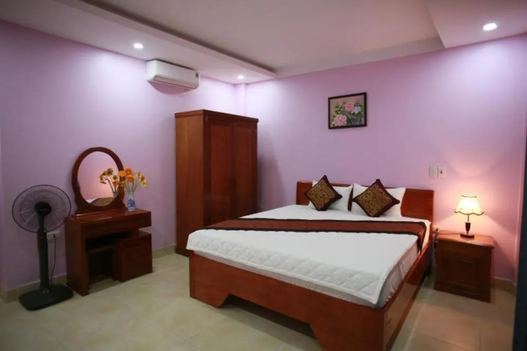 Bed in The Jade Dragon hotel