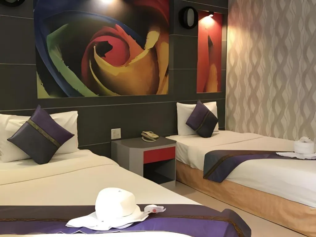 Bed in Phitsanulok Orchid Hotel