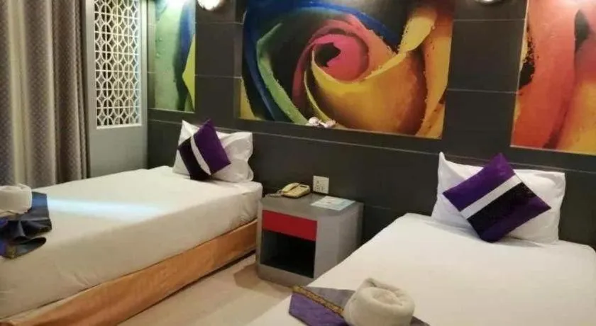Bed in Phitsanulok Orchid Hotel