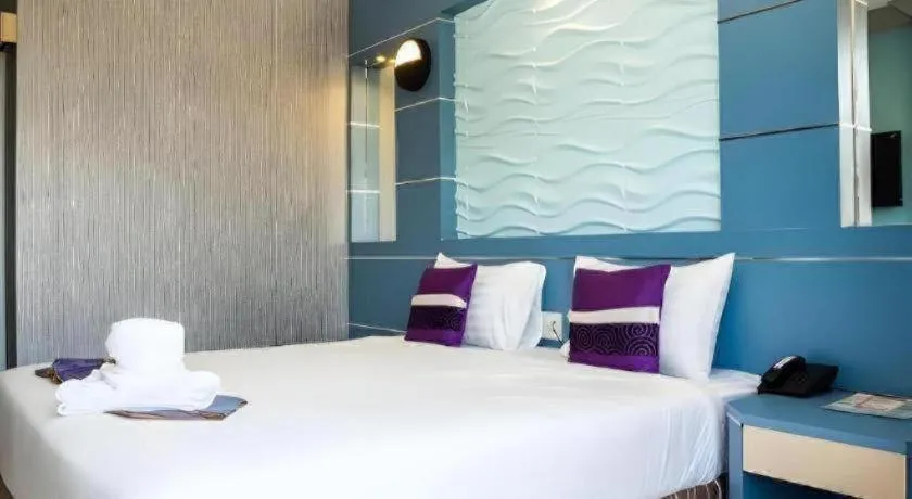 Bed in Phitsanulok Orchid Hotel