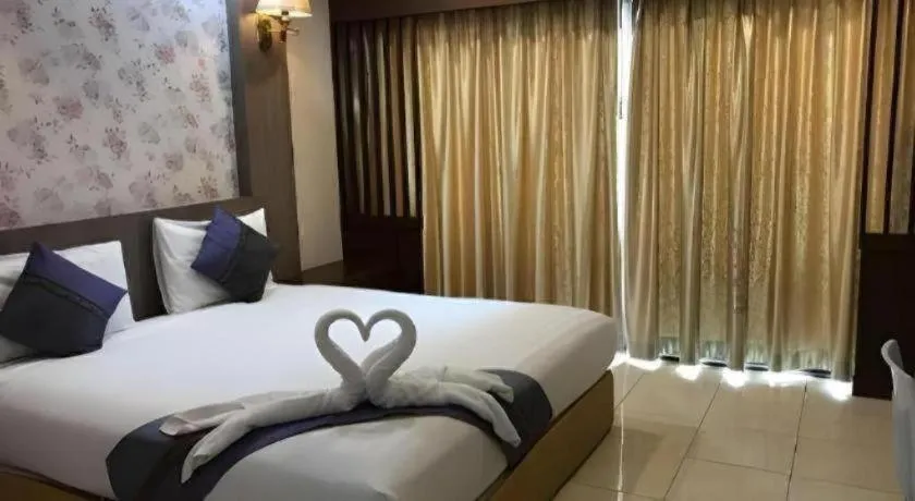 Bed in Phitsanulok Orchid Hotel