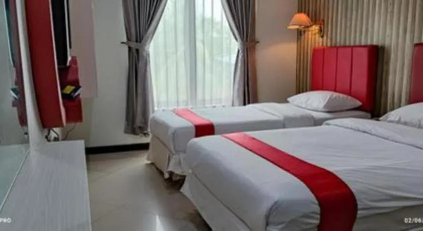 Bed in Queen City Hotel