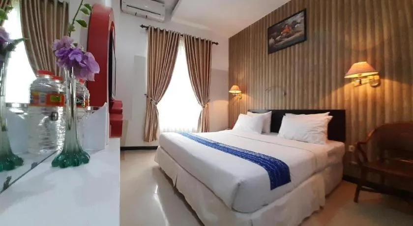 Bed in Queen City Hotel