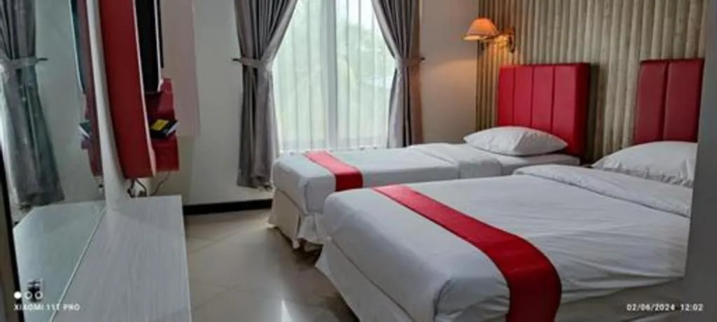 Bed in Queen City Hotel