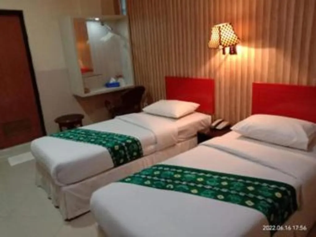 Bed in Queen City Hotel