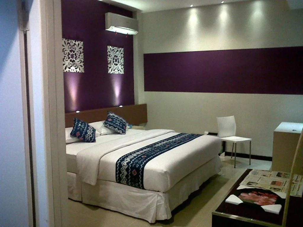 Bed in Queen City Hotel