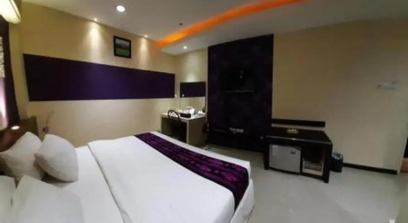 Bed in Queen City Hotel