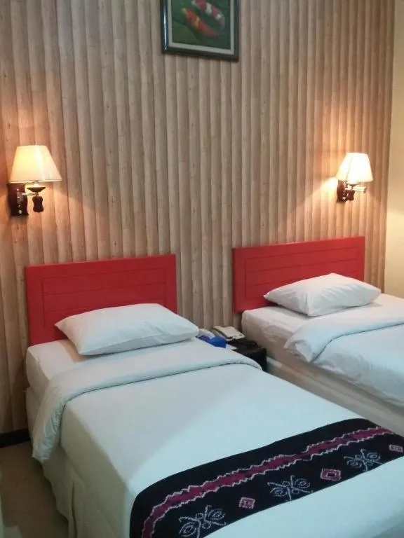 Bed in Queen City Hotel