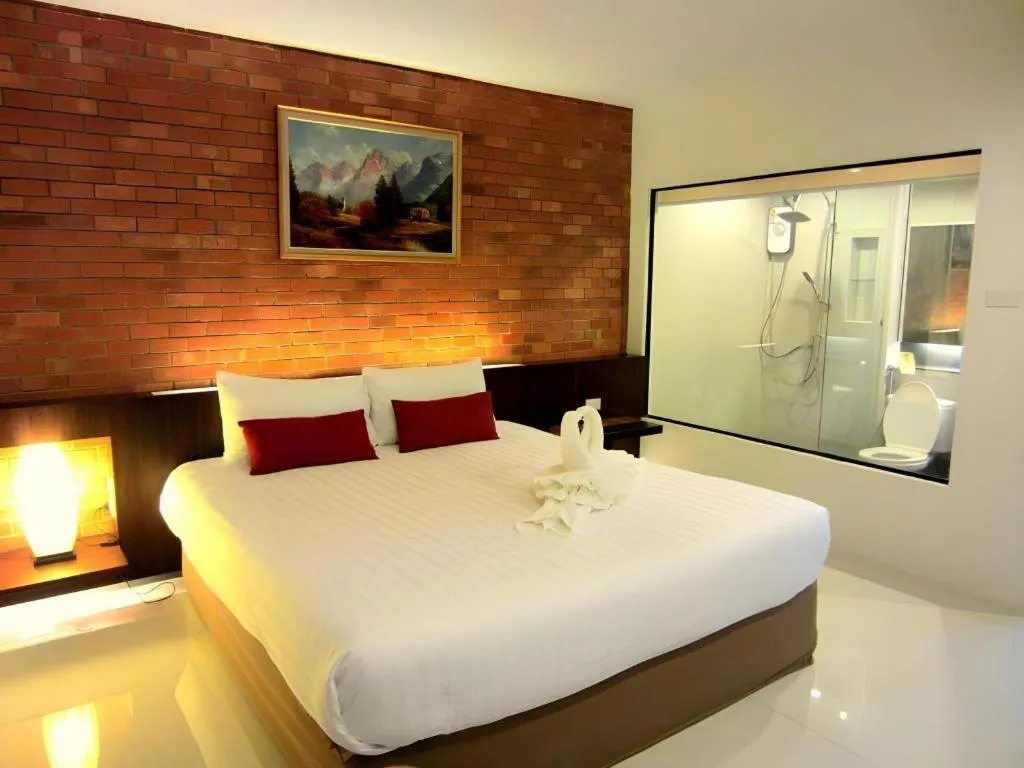 Bed in De Aerng Boutique Hotel