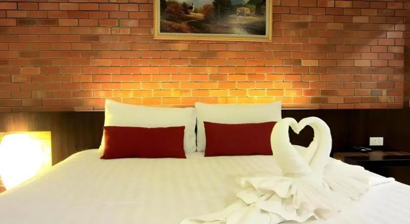 Bed in De Aerng Boutique Hotel