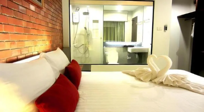 Bed in De Aerng Boutique Hotel