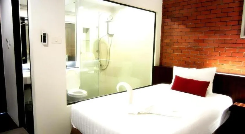 Bed in De Aerng Boutique Hotel