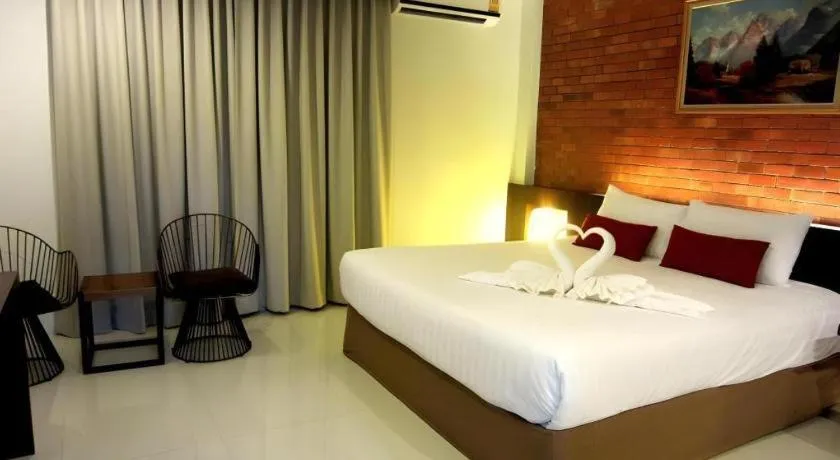 Bed in De Aerng Boutique Hotel