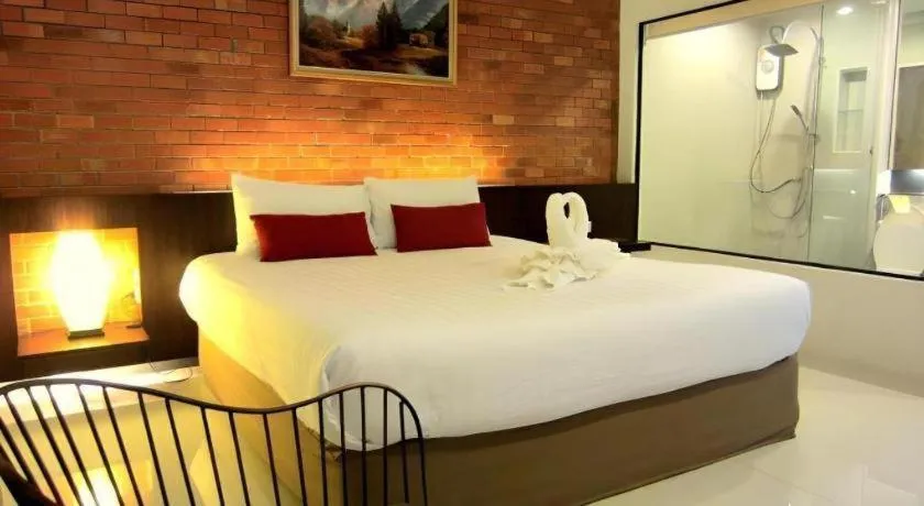Bed in De Aerng Boutique Hotel