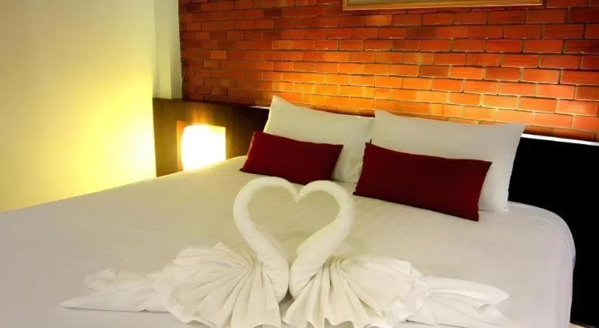 Bed in De Aerng Boutique Hotel