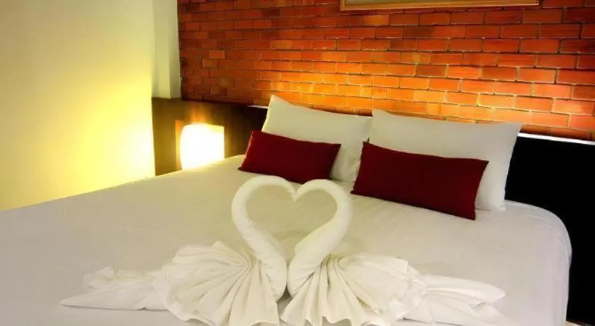 Bed in De Aerng Boutique Hotel