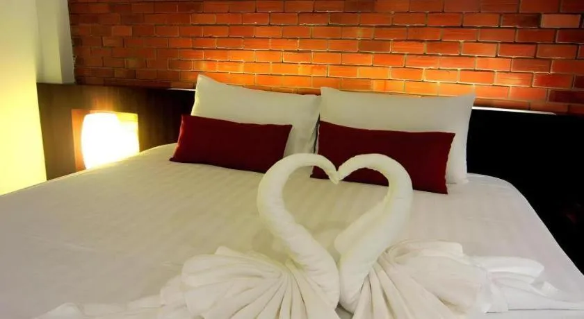 Bed in De Aerng Boutique Hotel