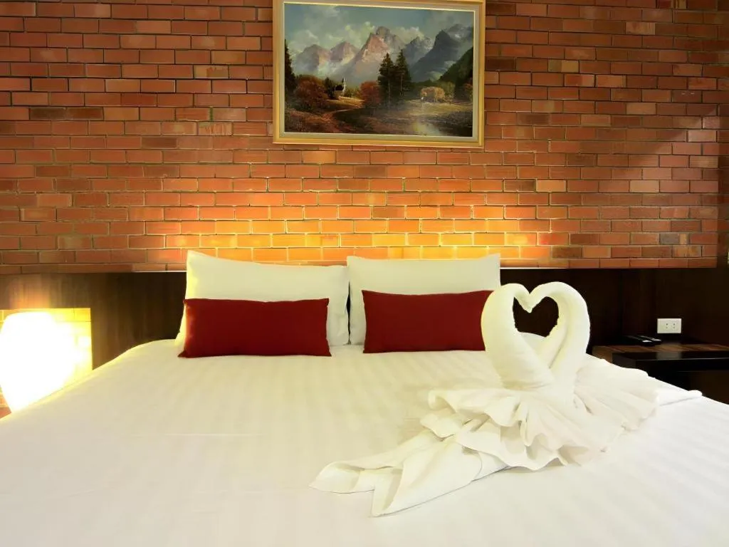 Bed in De Aerng Boutique Hotel