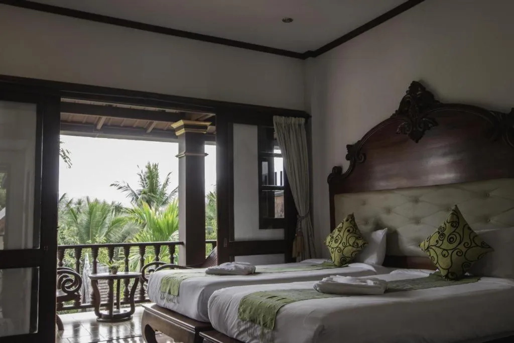 Bed in The View Pavilion Hotel