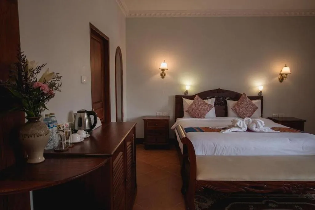 Bed in The View Pavilion Hotel