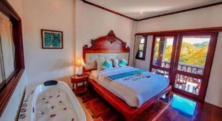 Bed in The View Pavilion Hotel