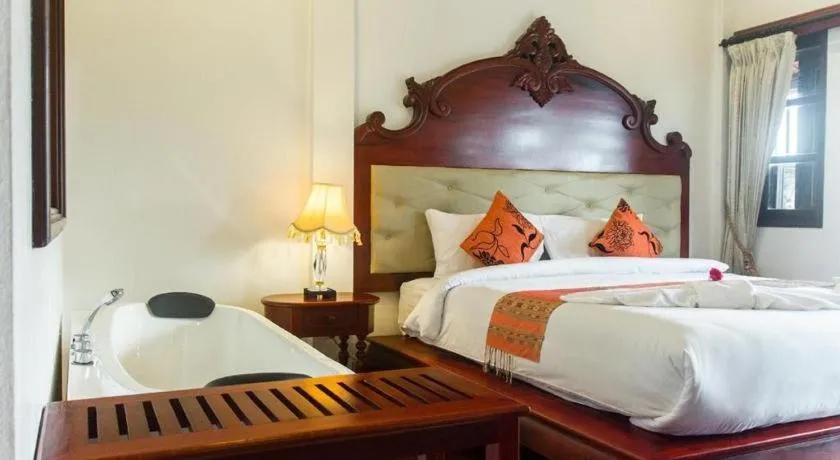 Bed in The View Pavilion Hotel