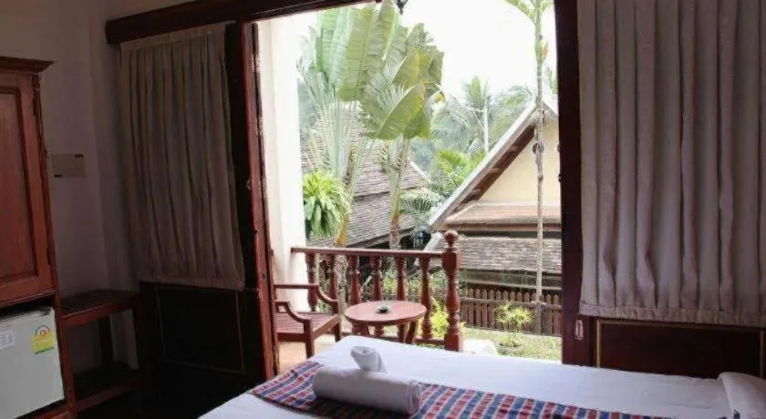 Bed in The View Pavilion Hotel