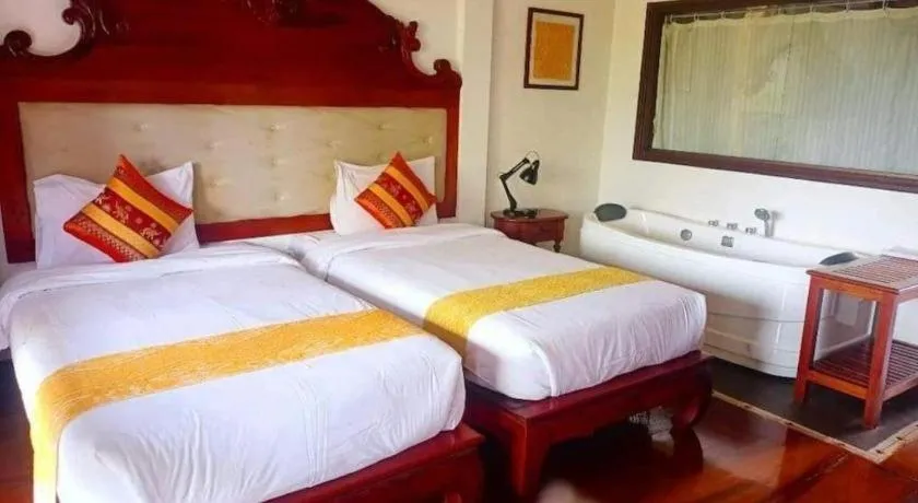 Bed in The View Pavilion Hotel