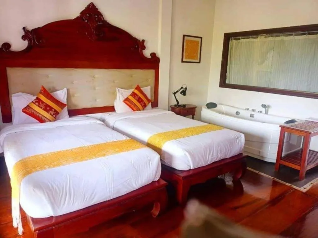 Bed in The View Pavilion Hotel