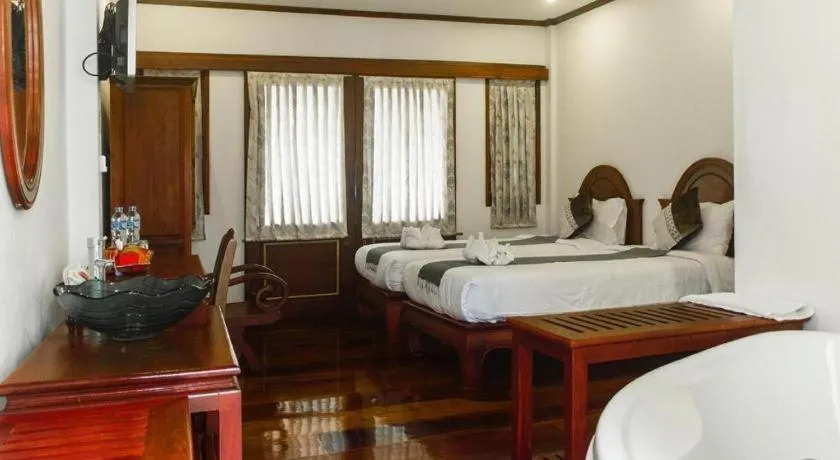 Bed in The View Pavilion Hotel