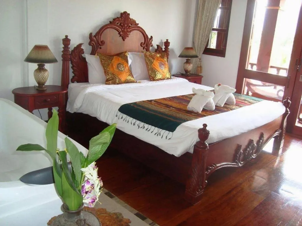 Bed in The View Pavilion Hotel