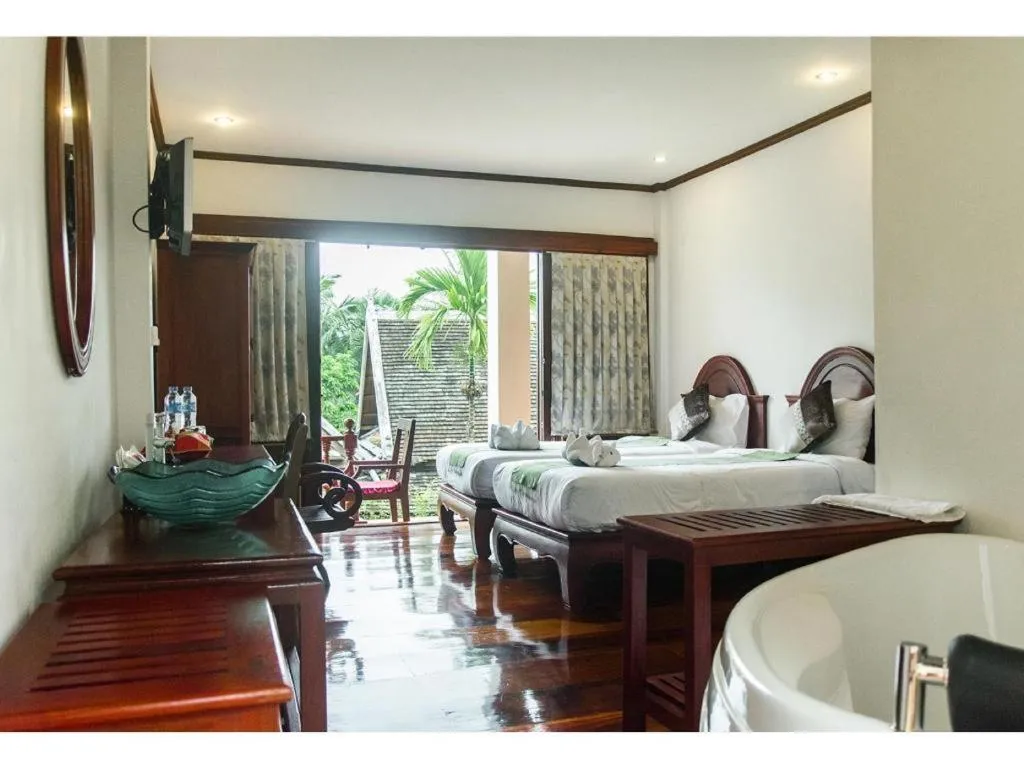 Bed in The View Pavilion Hotel