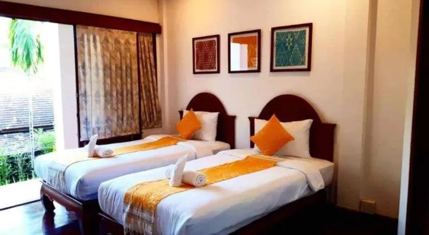 Bed in The View Pavilion Hotel