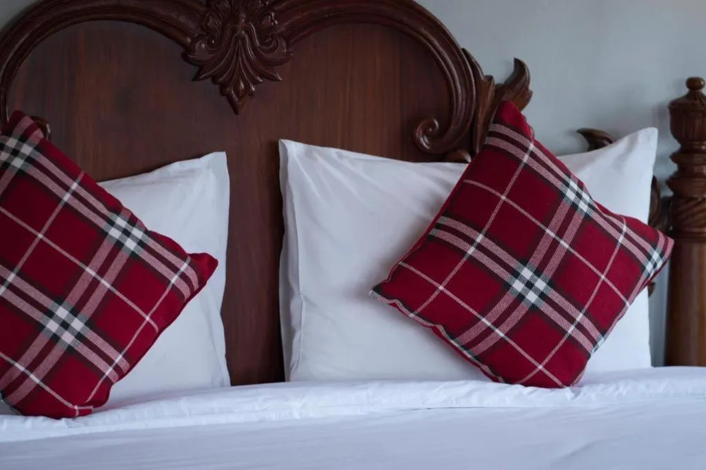 Bed in The View Pavilion Hotel