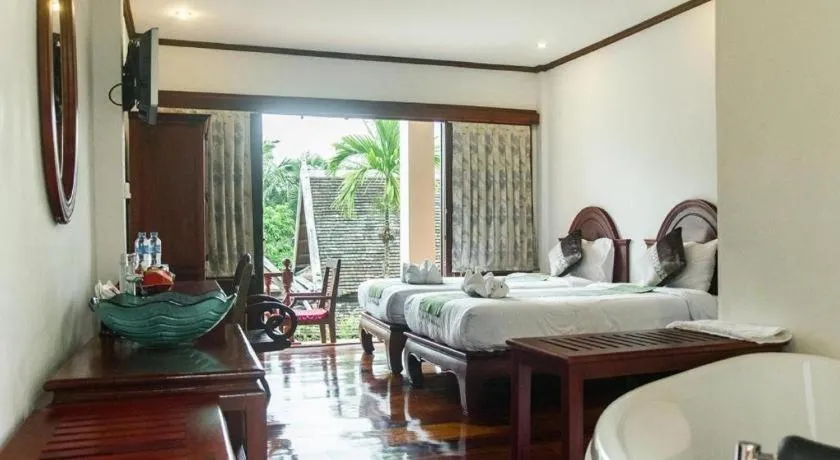 Bed in The View Pavilion Hotel