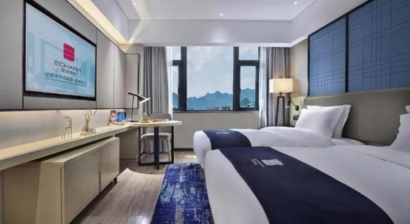Bed in Echarm Hotel Guilin North High Speed Railway Station