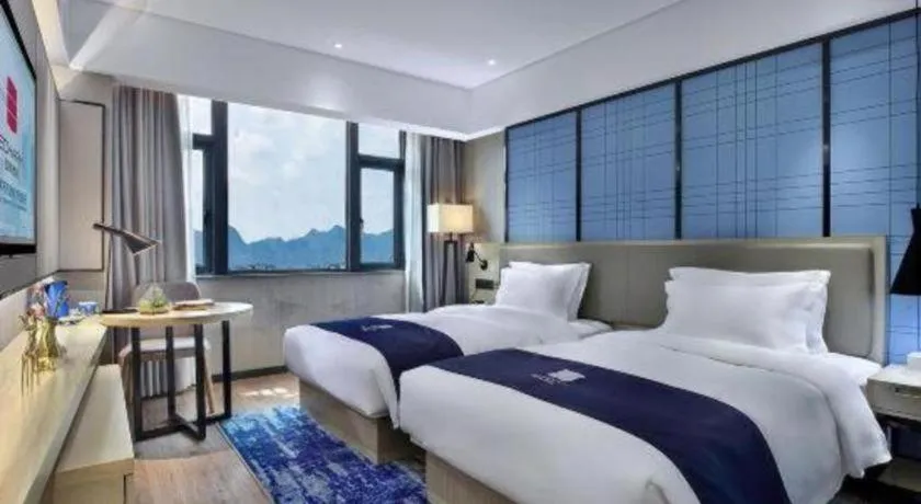 Bed in Echarm Hotel Guilin North High Speed Railway Station