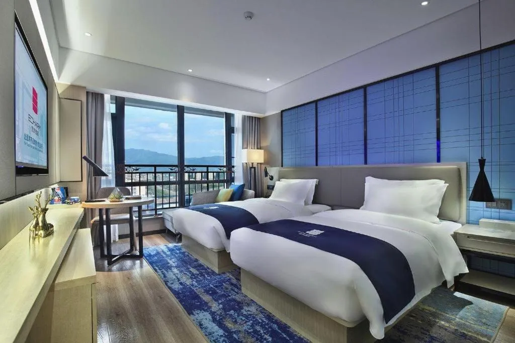 Bed in Echarm Hotel Guilin North High Speed Railway Station