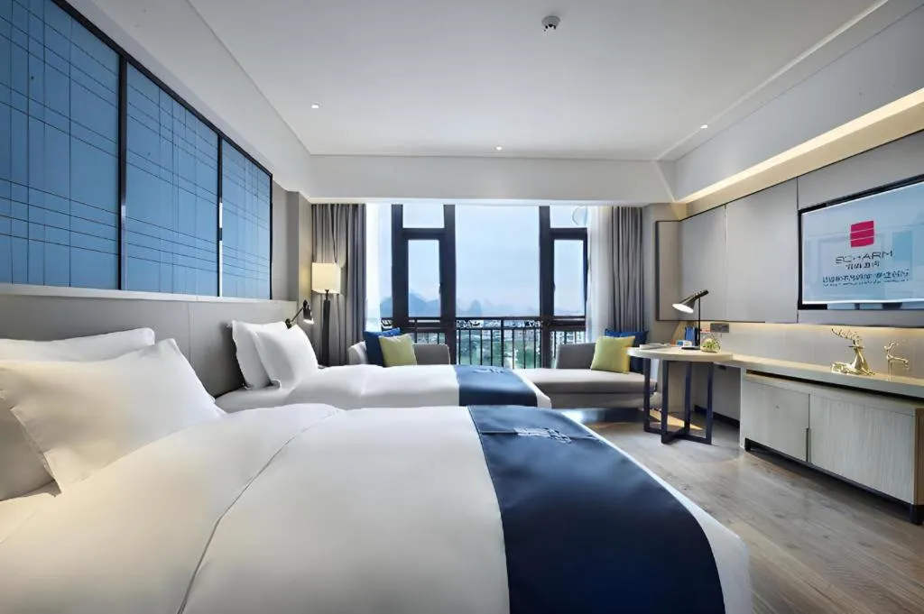 Bed in Echarm Hotel Guilin North High Speed Railway Station