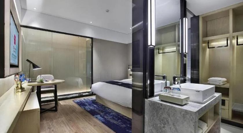 Bed in Echarm Hotel Guilin North High Speed Railway Station