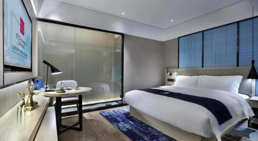 Bed in Echarm Hotel Guilin North High Speed Railway Station