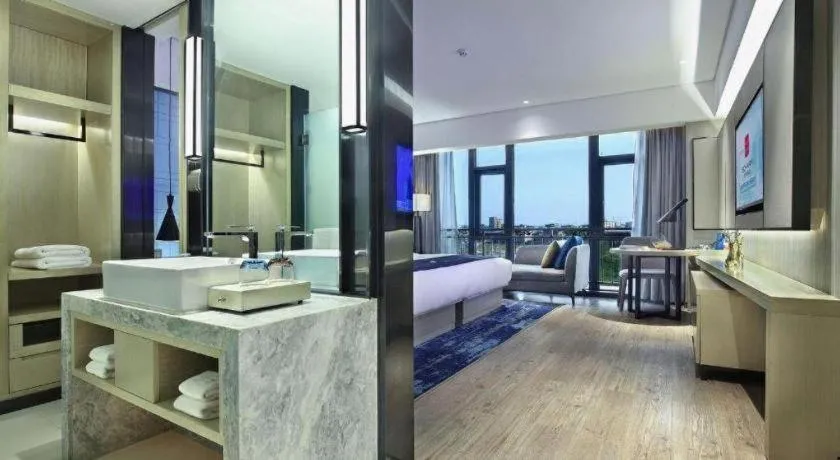 Bed in Echarm Hotel Guilin North High Speed Railway Station