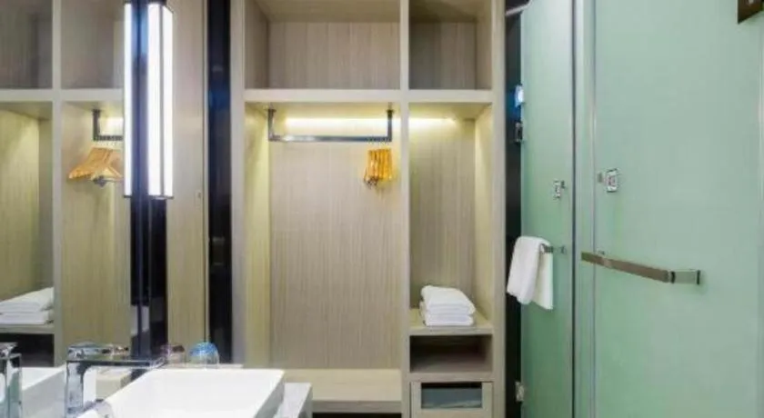 Bed in Echarm Hotel Guilin North High Speed Railway Station