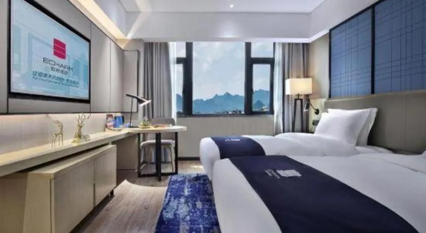 Bed in Echarm Hotel Guilin North High Speed Railway Station