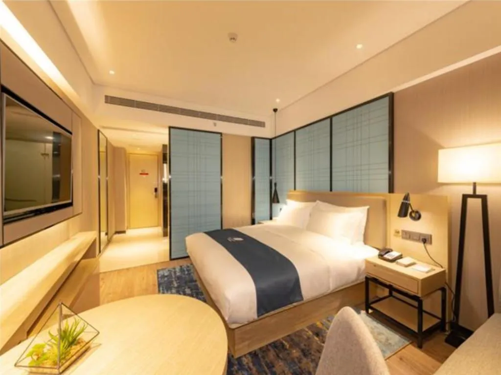 Bed in Echarm Hotel Guilin North High Speed Railway Station