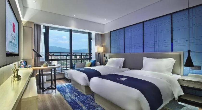 Bed in Echarm Hotel Guilin North High Speed Railway Station