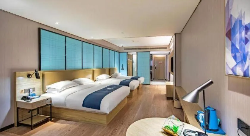 Bed in Echarm Hotel Guilin North High Speed Railway Station