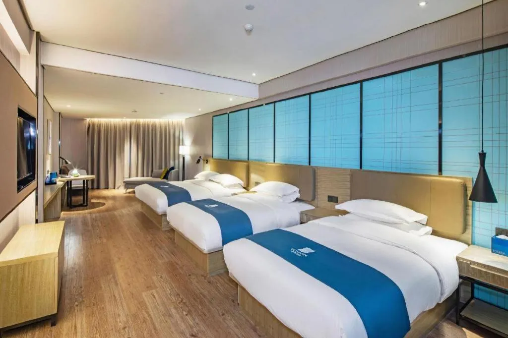 Bed in Echarm Hotel Guilin North High Speed Railway Station